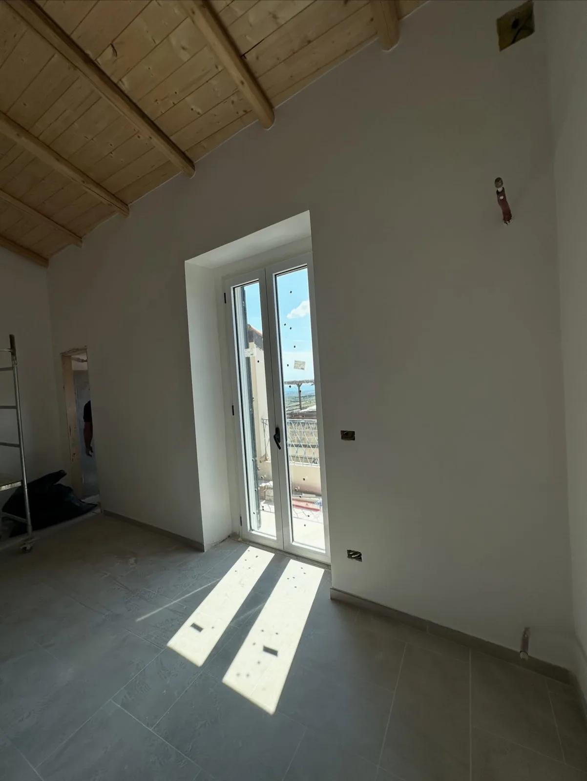 Ristrutturazione con tetto in legno
